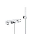GROHE - Grohe Set bain/douche mitigeur thermostatique cascade + Douchette Stick 1 jet, support mural, flexible, Chrome (34467001-CUBESTICK) - vignette