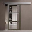 GD MENUISERIES - Porte Coulissante Gris Taupe RAL 7006 Vitrage transparent H204 x L73 cm, rail alu, coquilles - vignette