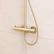AURLANE - Colonne de douche Thermostatique finition Or Doré Brossé 133x26x52 cm - MOLLY GOLD - vignette