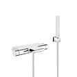 GROHE - Grohe Set bain/douche mitigeur thermostatique cascade + Douchette Stick 1 jet, support mural, flexible, Chrome (34467001-CUBESTICK) - vignette