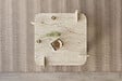 HABITAT ET JARDIN - Table basse en bois "Woog" 90 x 90 x 35 cm - Travertin - vignette