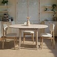 HABITAT ET JARDIN - Table à manger extensible en bois "Viona" 100 x 100 x 75 cm - Travertin - vignette