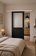 GD MENUISERIES - Porte Coulissante Athena Noir H204 x L93 cm, Rail Alu Bandeau blanc, Coquilles - vignette