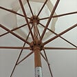 HAPPY GARDEN - Parasol droit HAPUNA rond 3,30m de diamètre beige et effet bois - vignette