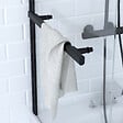 AURLANE - Pare baignoire Pivotant avec Porte-Serviette 85x150cm - Profilé Noir - Verre 6mm - TSHAPE DARK - vignette