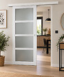GD MENUISERIES - Porte Coulissante Tana Blanc Vitrée H204 X L93 cm, Rail Alu Bandeau Blanc, Coquilles Blanc - vignette